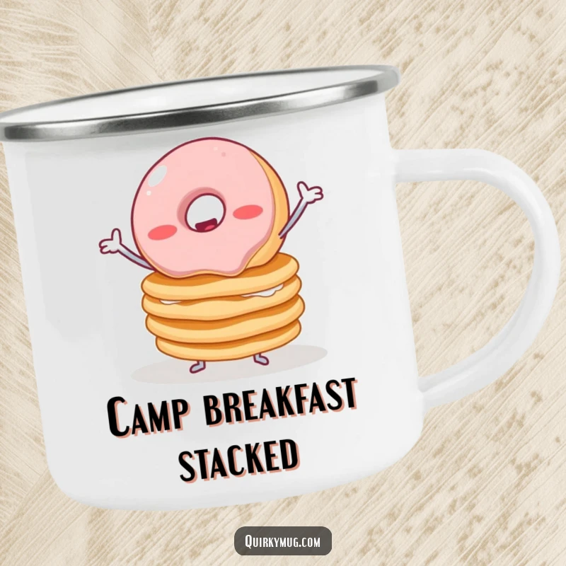 Funny camping mug showcasing a wobbly jelly donut with tiny arms precariously balancing pancakes, designed for outdoor enjoyment.