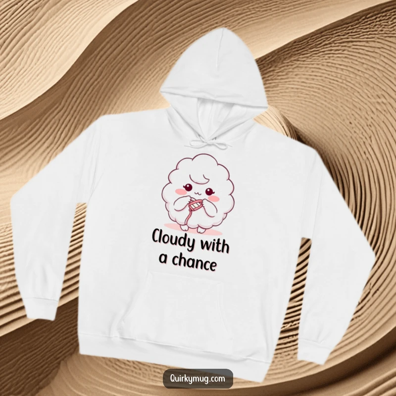 Funny hoodie depicting a fluffy cloud character humorously knitting with its own ephemeral mist, a cozy and comical scene.
