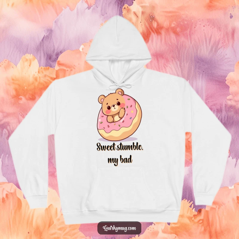Funny hoodie: Cheerful bear character comically tripping over a giant rolling donut, expressing pure surprise, excellent funny gift.