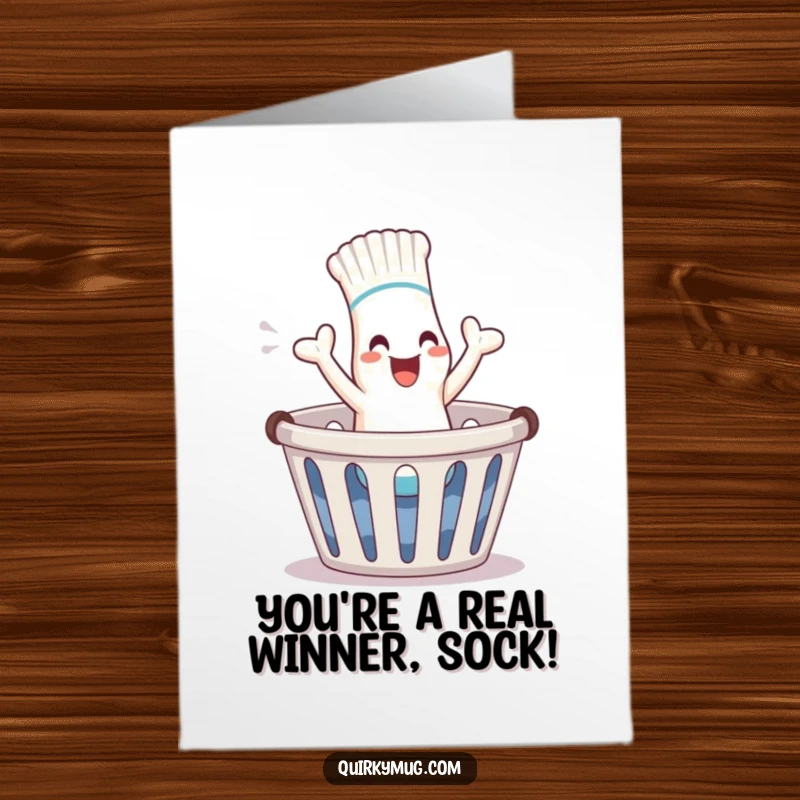 Free Printable Congratulations Card: A giggling sock character triumphantly leaping out of a laundry basket, celebrating an achievement.