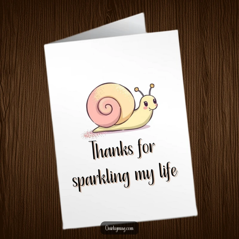Funny Free Printable Thank You Card depicting a cheerful snail leaving behind a shimmering glitter trail of appreciation.