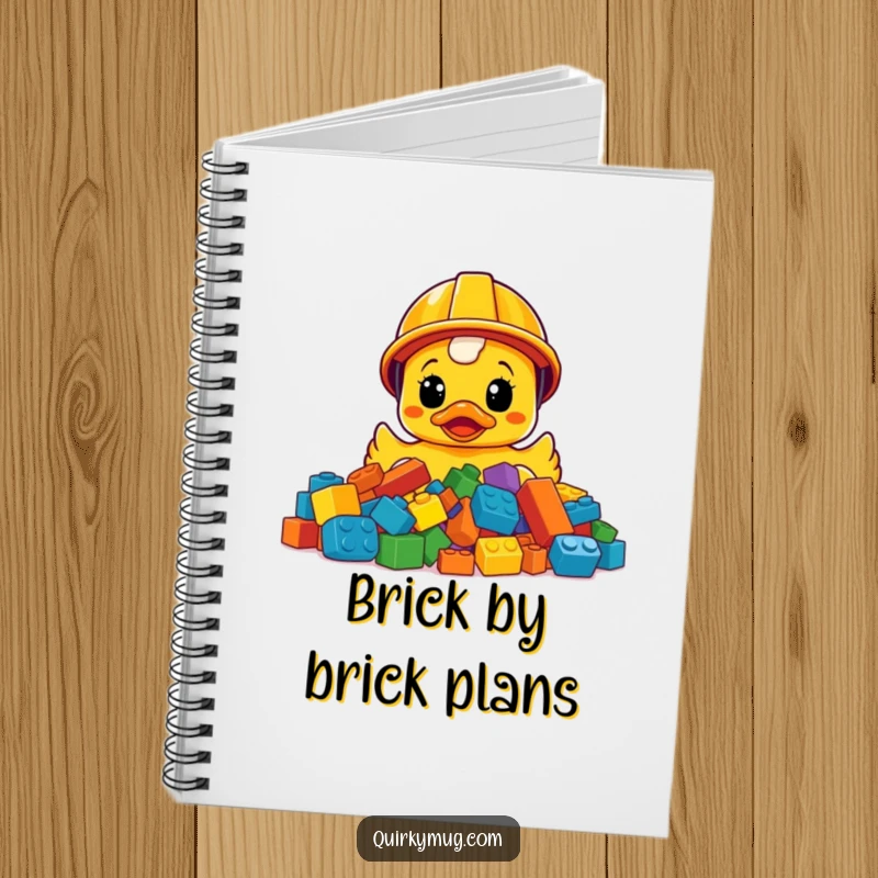 Funny surprised rubber ducky in construction helmet, bewildered by LEGOs, a humorous notebook.