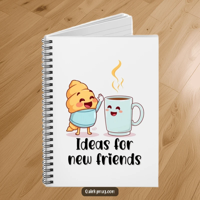 Funny croissant character high-fiving a bewildered mug on a notebook cover, ideal funny gift.