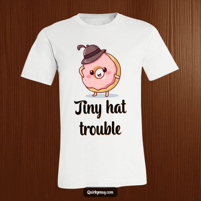 Funny donut character hilariously failing to keep a tiny hat on, a relatable and cute graphic for a t-shirt.