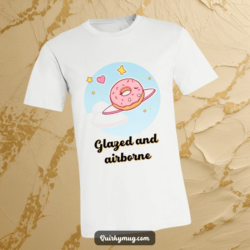 Funny t-shirt depicting a sleepy doughnut character joyfully flying through the sky in a dream, embodying sweet fantasies.
