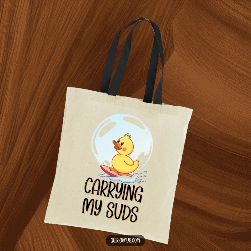 Funny rubber duck character attempting to surf a huge soap bubble, a comical and practical tote bag design.