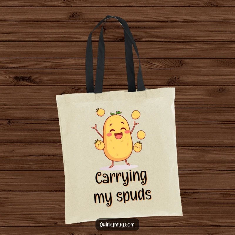 Funny tote bag illustrating a clumsy potato character’s spirited but wobbly attempt at juggling three smaller potatoes, perfect for grocery runs.